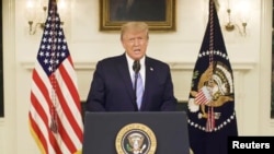 U.S President Donald Trump gives an address, a day after his supporters stormed the U.S. Capitol in Washington, U.S. Трамп жақтастары Капитолийді басып алғаннан бір күн өткен соң мәлімдеме жасап тұр.