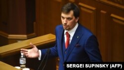 Олексій Гончарук під час виступу у Верховній Раді, яка проголосувала того дня за призначення його прем'єр-міністром України. Київ, 29 серпня 2019 року