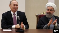 Putin və Ruhani ABŞ-ın Suriyadakı "təcavüzünü" pisləyiblər