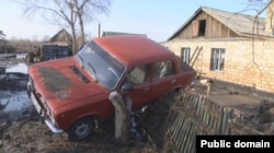 Бұқар жырау ауданындағы су тасқынынан кейінгі жағдай. Қазақстан, Қарағанды облысы, 31 наурыз 2014 жыл. Сурет bnews.kz ақпараттық агенттігінің Твиттер акаунтынан алынды.