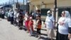 Kazakhstan - A group of people protests in front of the Chinese Conculate in Almaty demanding to release their relatives in China. 1 June 2021